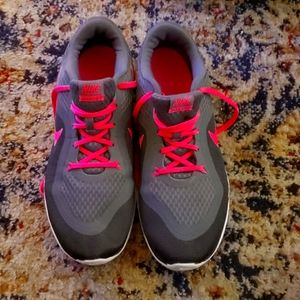 Grey and pink nike womens running shoes size 10... gently worn some